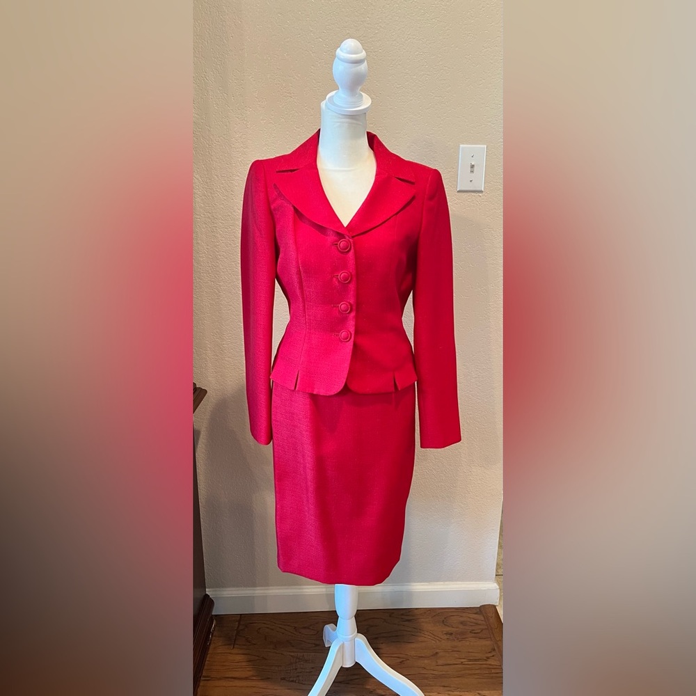 Woman’s red suit.